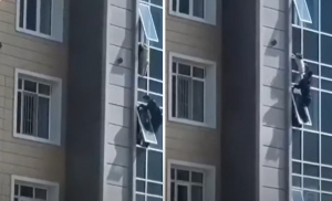 Ήρωας σώζει 3χρονο κορίτσι που κρεμόταν έξω από το παράθυρο 8ου ορόφου στο Καζακστάν, συγκλονιστικό βίντεο